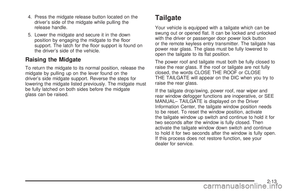 GMC ENVOY XUV 2004  Owners Manual 4. Press the midgate release button located on the
drivers side of the midgate while pulling the
release handle.
5. Lower the midgate and secure it in the down
position by engaging the midgate to the