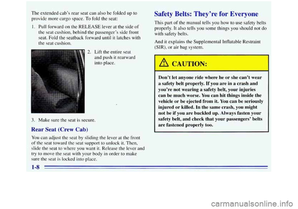 GMC SIERRA 1996  Owners Manual The extended cab’s rear seat can also be folded  up to 
provide more cargo  space. To fold the  seat: 
1. Pull forward on the RELEASE lever at the side of 
the seat cushion, behind the passenger’s