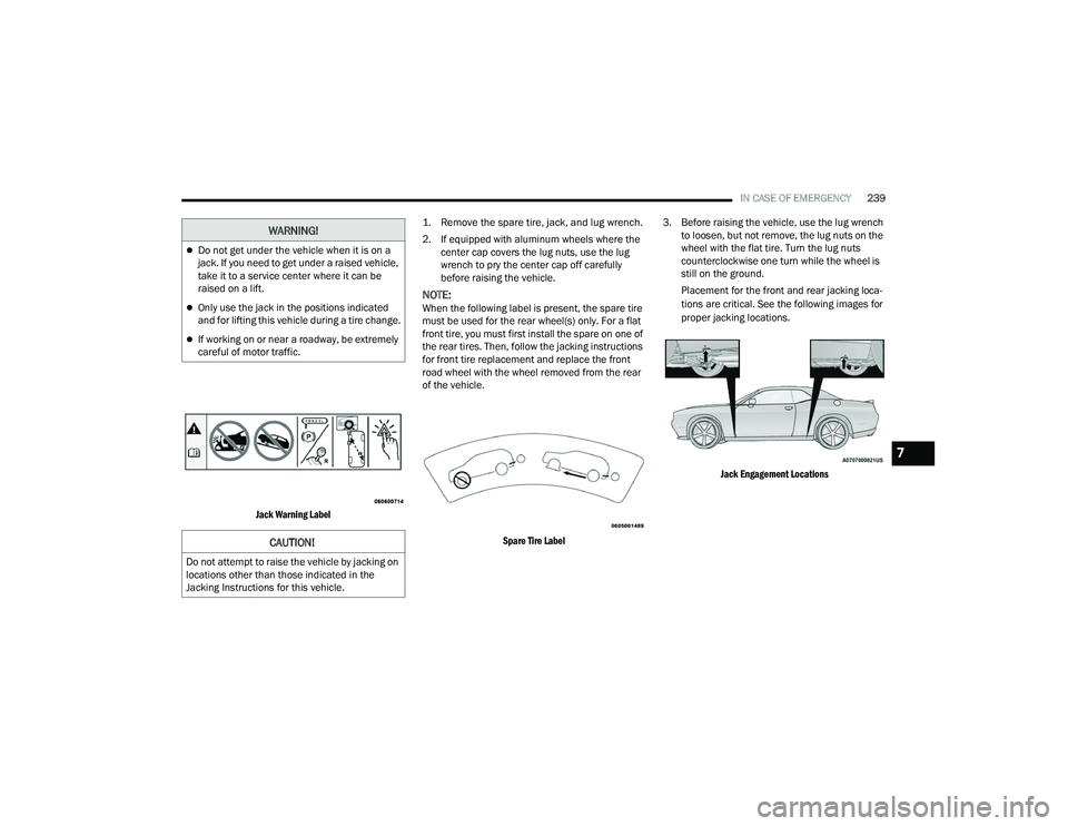 DODGE CHALLENGER 2022  Owners Manual 
IN CASE OF EMERGENCY239

Jack Warning Label
 1. Remove the spare tire, jack, and lug wrench.

2. If equipped with aluminum wheels where the 
center cap covers the lug nuts, use the lug 
wrench to pry