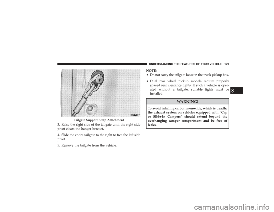 DODGE RAM 2500 DIESEL 2009 4.G Owners Manual 3. Raise the right side of the tailgate until the right side
pivot clears the hanger bracket.
4. Slide the entire tailgate to the right to free the left side
pivot.
5. Remove the tailgate from the veh