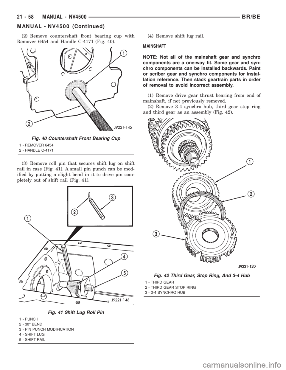 DODGE RAM 2001  Service Repair Manual (2) Remove countershaft front bearing cup with
Remover 6454 and Handle C-4171 (Fig. 40).
(3) Remove roll pin that secures shift lug on shift
rail in case (Fig. 41). A small pin punch can be mod-
ified