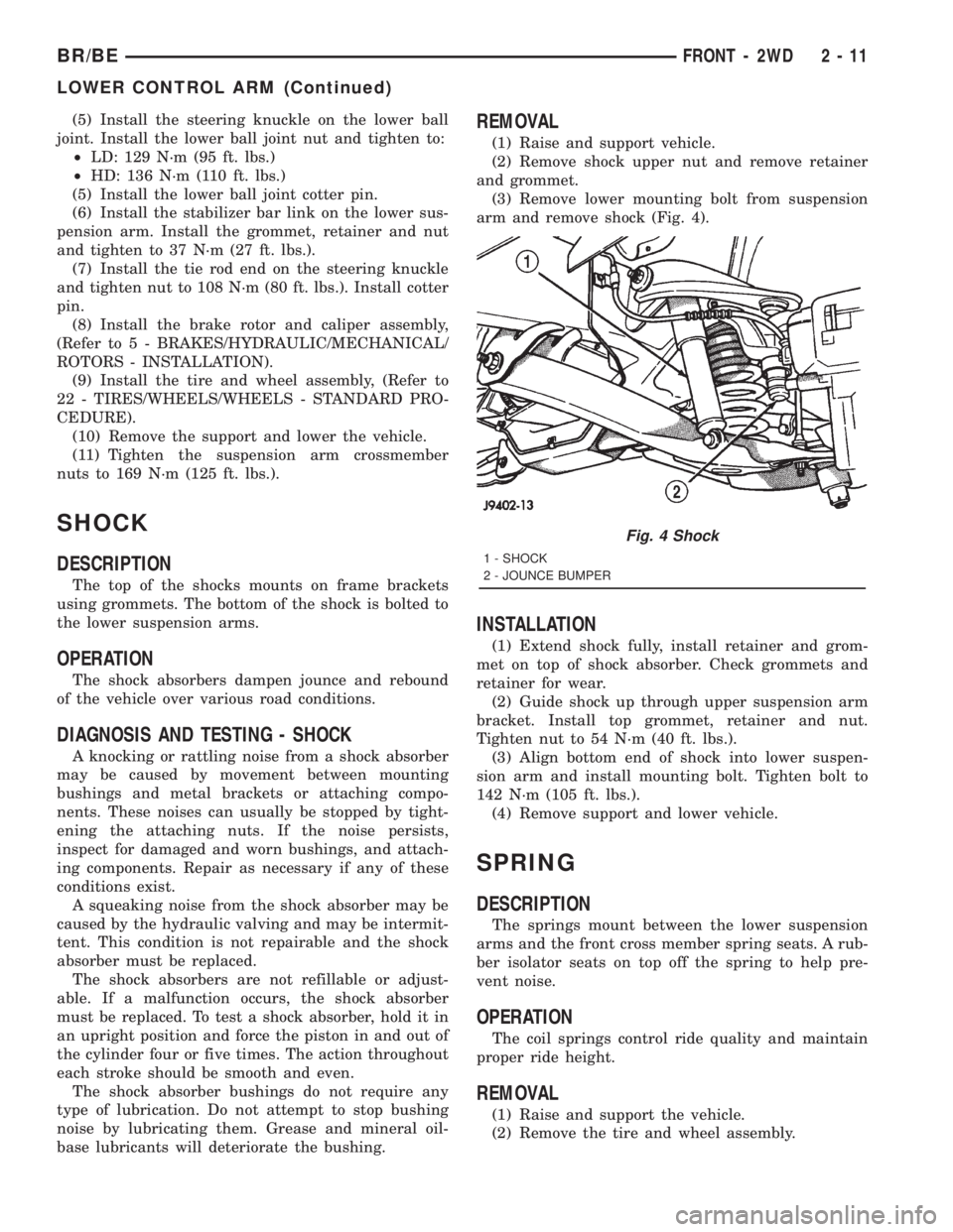 DODGE RAM 2001  Service Workshop Manual (5) Install the steering knuckle on the lower ball
joint. Install the lower ball joint nut and tighten to:
²LD: 129 N´m (95 ft. lbs.)
²HD: 136 N´m (110 ft. lbs.)
(5) Install the lower ball joint c