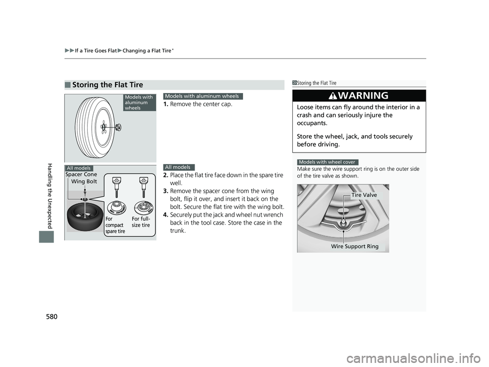 HONDA CIVIC SEDAN 2018  Owners Manual (in English) uuIf a Tire Goes Flat uChanging a Flat Tire*
580
Handling the Unexpected
1. Remove the center cap.
2. Place the flat tire face down in the spare tire 
well.
3. Remove the spacer  cone from the wing 
b