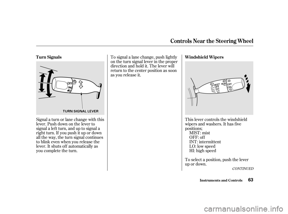 HONDA INSIGHT 2001 1.G Repair Manual Signal a turn or lane change with this 
lever. Push down on the lever to
signal a lef t turn, and up to signal a
right turn. If you push it up or down
all the way, the turn signal continues
to blink e