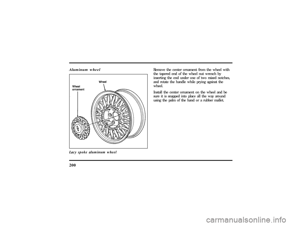 LINCOLN TOWN CAR 1997  Owners Manual 200Aluminum wheelLacy spoke aluminum wheel
Remove the center ornament from the wheel with
the tapered end of the wheel nut wrench by
inserting the end under one of two raised notches,
and rotate the h