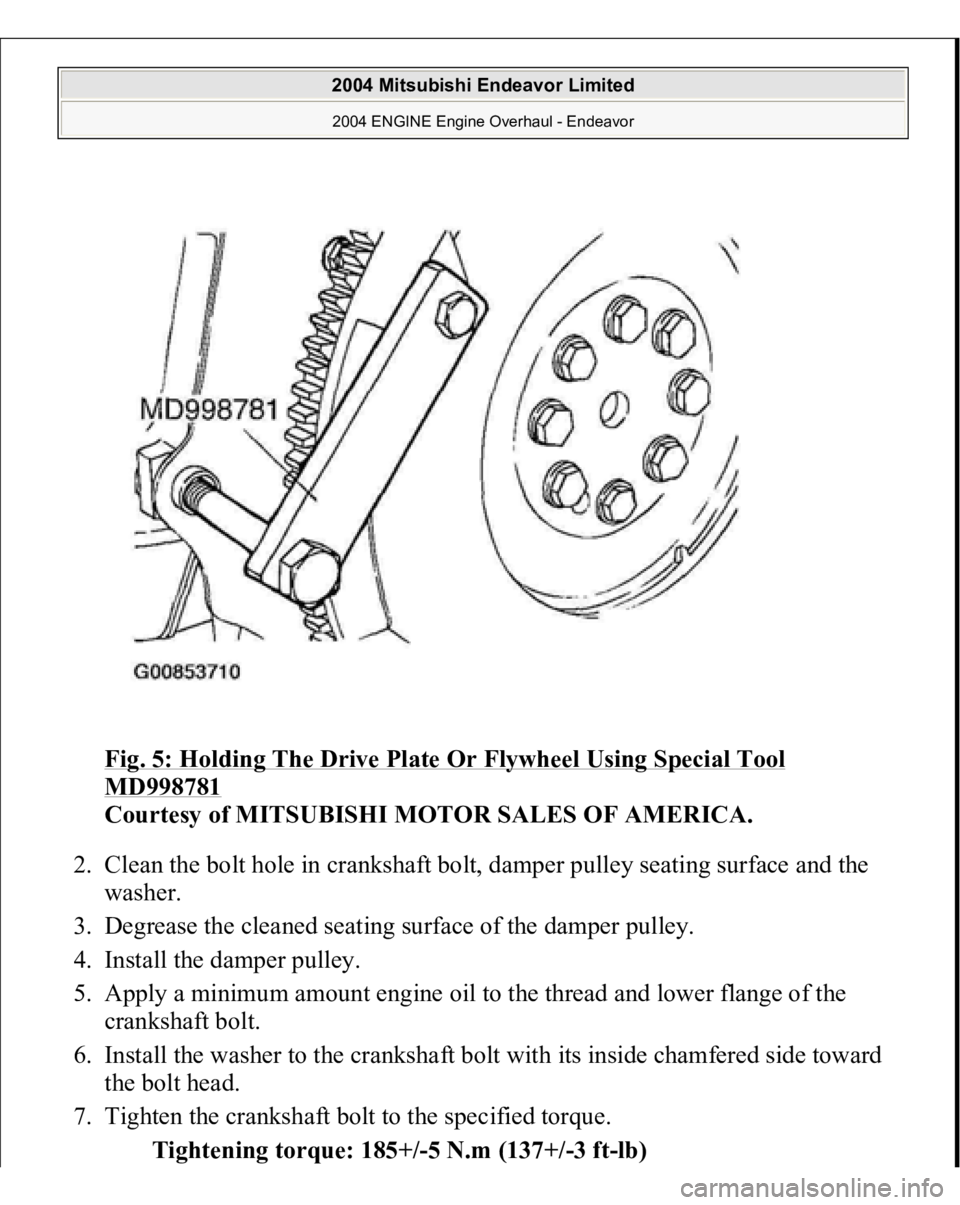 MITSUBISHI ENDEAVOR 2004  Service Repair Manual Fig. 5: Holding The Drive Plate Or Flywheel Using Special Tool MD998781
 
Courtesy of MITSUBISHI MOTOR SALES OF AMERICA. 
2. Clean the bolt hole in crankshaft bolt, damper pulley seating surface and t