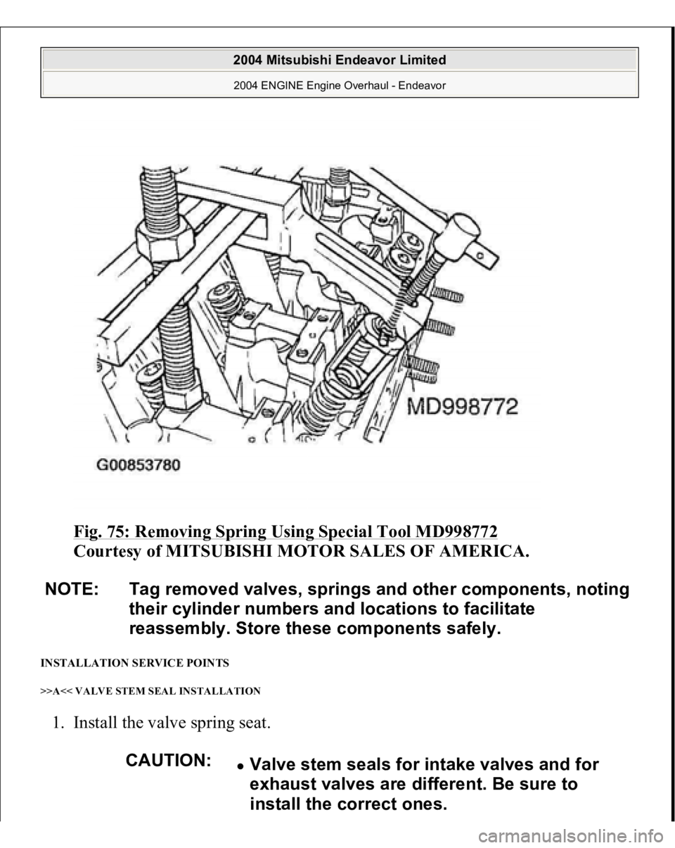MITSUBISHI ENDEAVOR 2004  Service Repair Manual Fig. 75: Removing Spring Using Special Tool MD998772
 
Courtesy of MITSUBISHI MOTOR SALES OF AMERICA. 
INSTALLATION SERVICE POINTS >>A<< VALVE STEM SEAL INSTALLATION 1. Install the valve spring seat. 