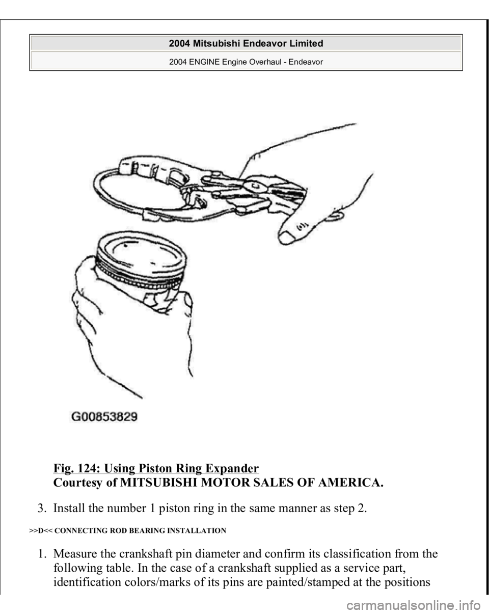 MITSUBISHI ENDEAVOR 2004  Service Repair Manual Fig. 124: Using Piston Ring Expander
 
Courtesy of MITSUBISHI MOTOR SALES OF AMERICA. 
3. Install the number 1 piston ring in the same manner as step 2.  
>>D<< CONNECTING ROD BEARING INSTALLATION 1. 