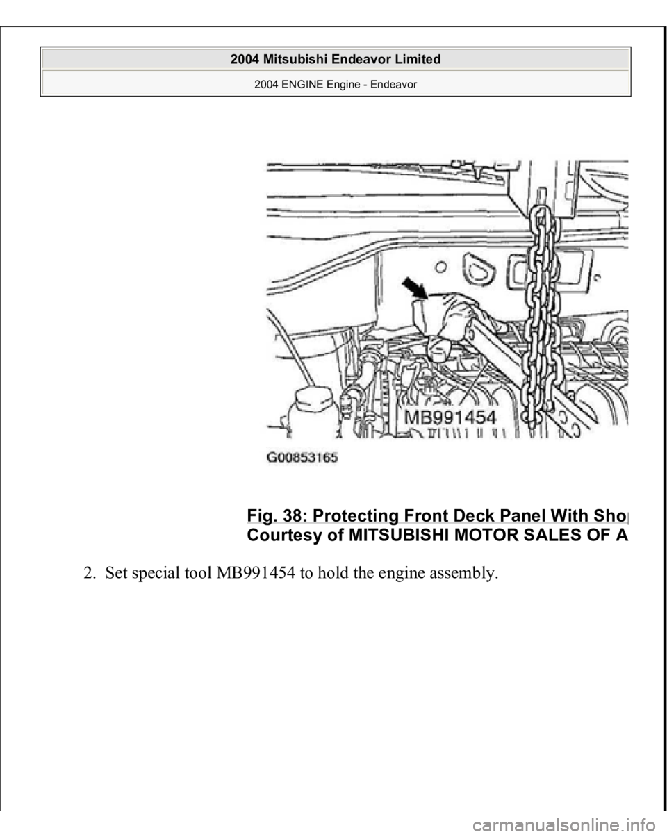 MITSUBISHI ENDEAVOR 2004  Service Repair Manual 2. Set s
pecial tool MB991454 to hold the en
gine assembl
y. 
Fig. 38: Protectin
g Front Deck Panel With Sho
p
Courtes
y of MITSUBISHI MOTOR SALES OF 
A
 
2004 Mitsubishi Endeavor Limited 
2004 ENGINE