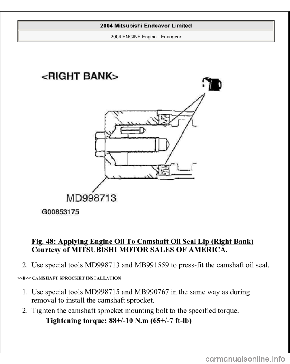 MITSUBISHI ENDEAVOR 2004  Service Repair Manual Fig. 48: Applying Engine Oil To Camshaft Oil Seal Lip (Right Bank)
 
Courtesy of MITSUBISHI MOTOR SALES OF AMERICA. 
2. Use special tools MD998713 and MB991559 to press-fit the camshaft oil seal. 
>>B