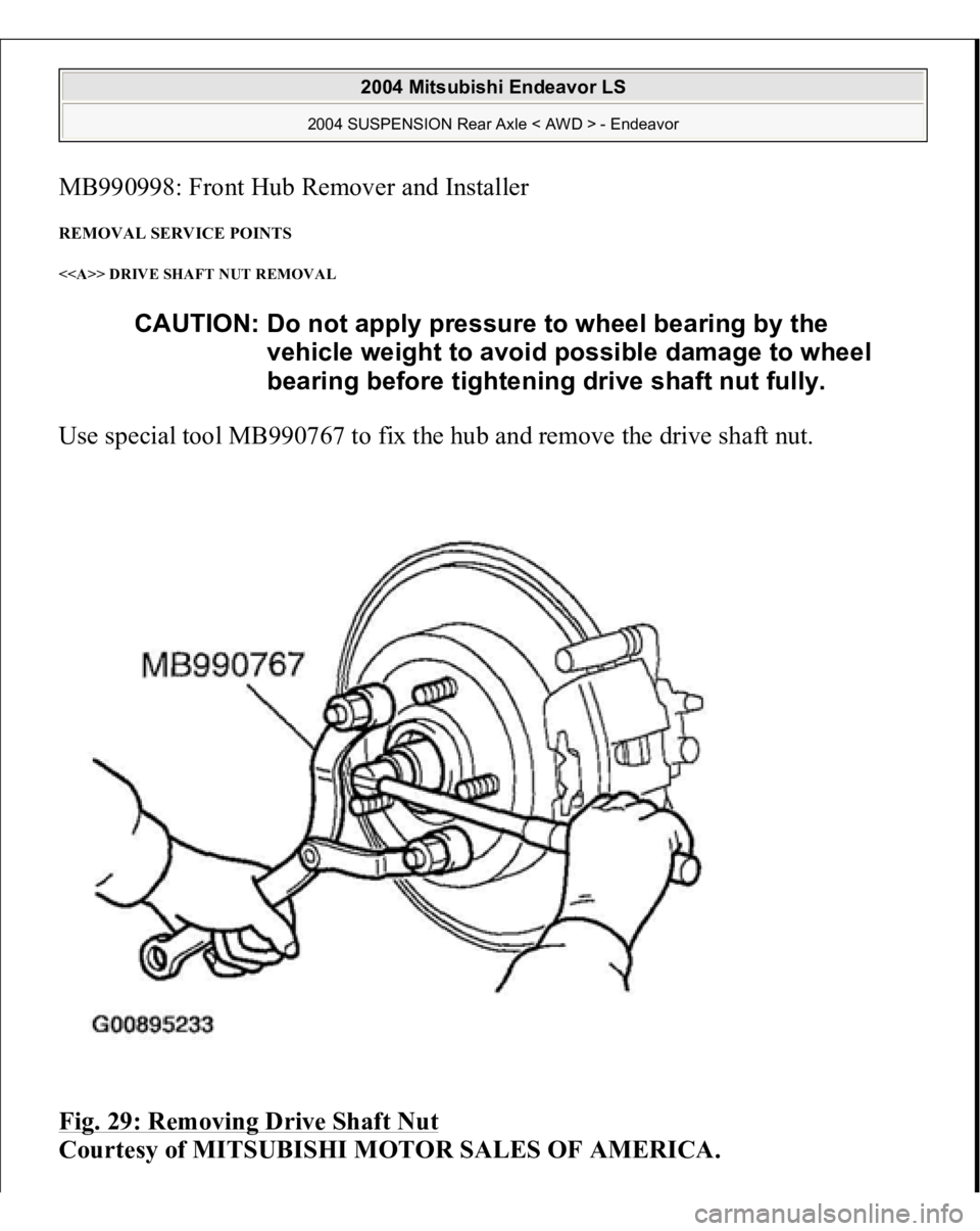 MITSUBISHI ENDEAVOR 2004  Service Repair Manual MB990998: Front Hub Remover and Installer REMOVAL SERVICE POINTS <<A>> DRIVE SHAFT NUT REMOVAL Use special tool MB990767 to fix the hub and remove the drive shaft nut. 
Fig. 29: Removing Drive Shaft N