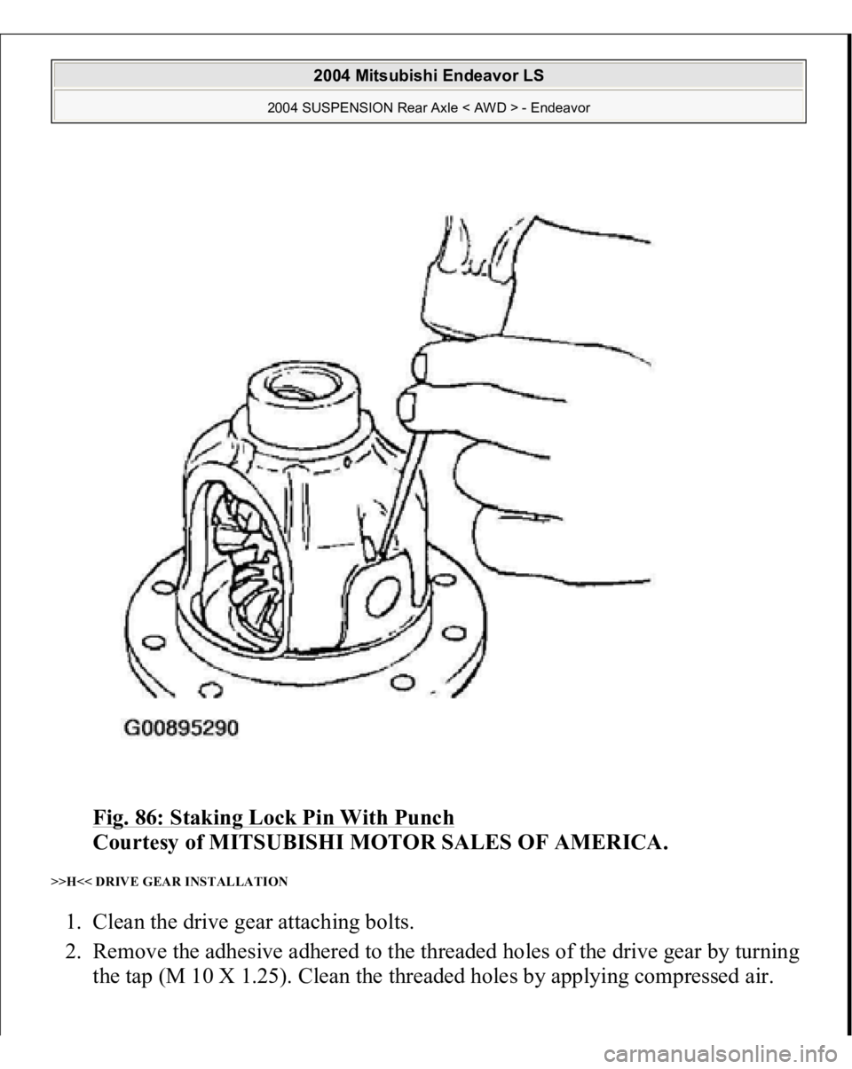 MITSUBISHI ENDEAVOR 2004  Service Repair Manual Fig. 86: Staking Lock Pin With Punch
 
Courtesy of MITSUBISHI MOTOR SALES OF AMERICA. 
>>H<< DRIVE GEAR INSTALLATION 1. Clean the drive gear attaching bolts.  
2. Remove the adhesive adhered to the th