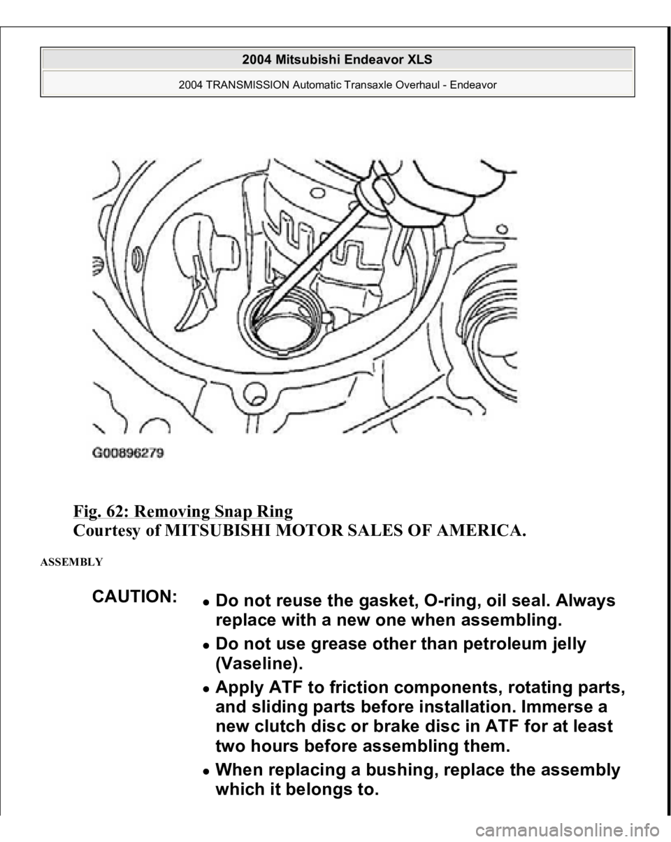 MITSUBISHI ENDEAVOR 2004  Service Repair Manual Fig. 62: Removing Snap Ring
 
Courtesy of MITSUBISHI MOTOR SALES OF AMERICA. 
ASSEMBLY 
CAUTION:
Do not reuse the gasket, O-ring, oil seal. Always 
replace with a new one when assembling.  Do not use 
