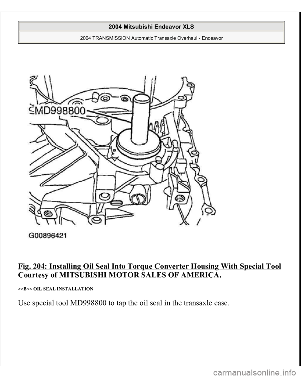 MITSUBISHI ENDEAVOR 2004  Service Repair Manual Fig. 204: Installing Oil Seal Into Torque Converter Housing With Special Tool
 
Courtesy of MITSUBISHI MOTOR SALES OF AMERICA. 
>>B<< OIL SEAL INSTALLATION Use special tool MD998800 to tap the oil sea
