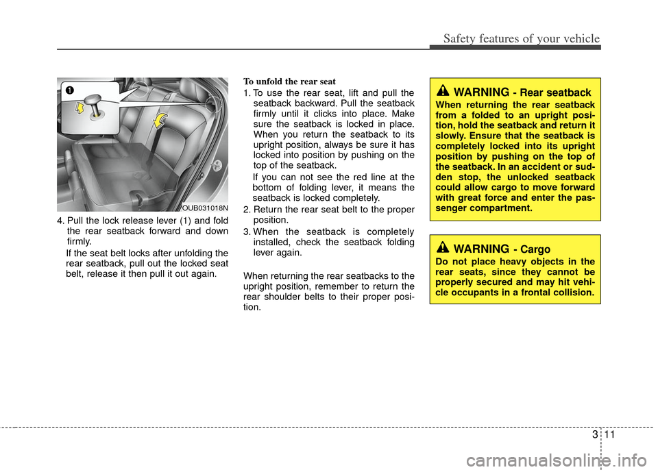 KIA Rio 2012 3.G Owners Manual 311
Safety features of your vehicle
4. Pull the lock release lever (1) and foldthe rear seatback forward and down
firmly.
If the seat belt locks after unfolding the
rear seatback, pull out the locked 