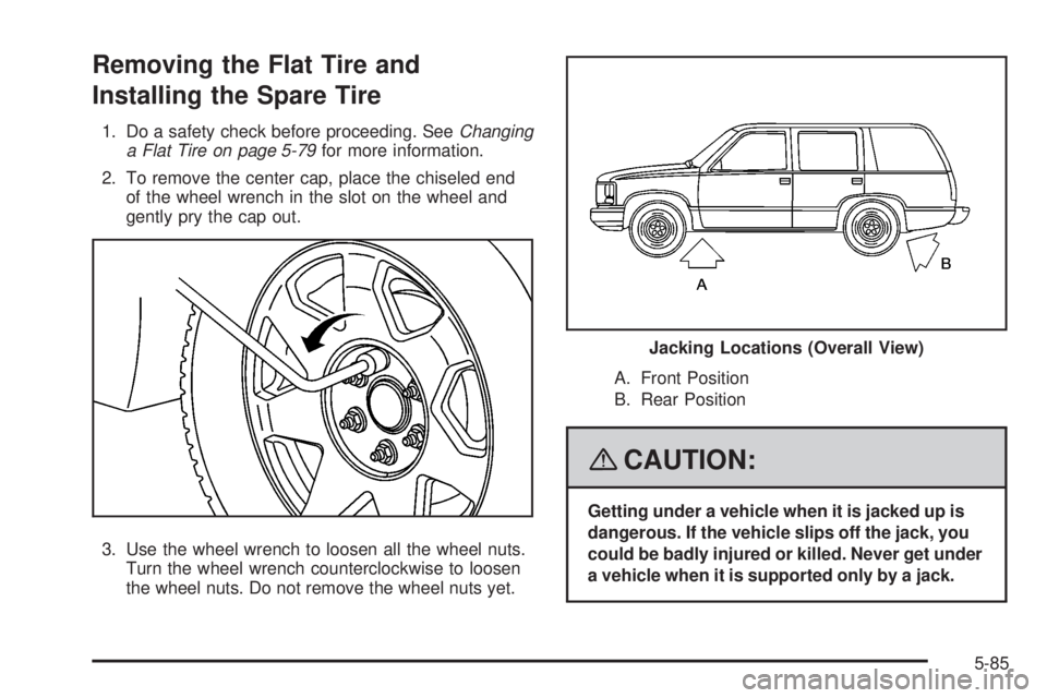 CADILLAC ESCALADE ESV 2008 Owners Manual Removing the Flat Tire and
Installing the Spare Tire 1. Do a safety check before proceeding. See Changing
a Flat Tire on page 5-79 for more information.
2. To remove the center cap, place the chiseled
