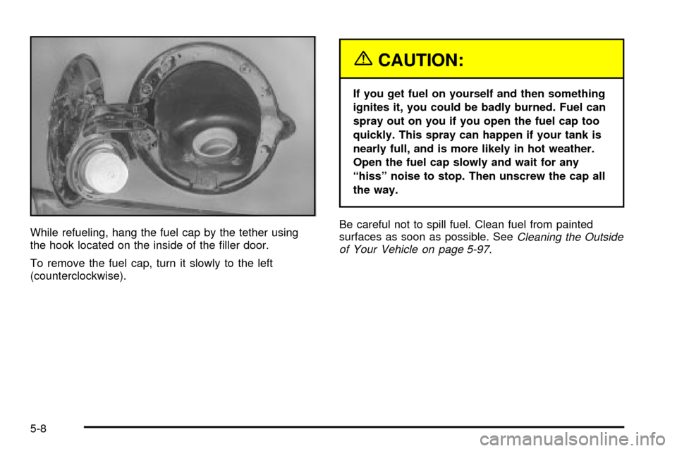 CADILLAC ESCALADE 2003 2.G Owners Manual While refueling, hang the fuel cap by the tether using
the hook located on the inside of the ®ller door.
To remove the fuel cap, turn it slowly to the left
(counterclockwise).
{CAUTION:
If you get fu CADILLAC ESCALADE 2003 2.G Owners Manual While refueling, hang the fuel cap by the tether using
the hook located on the inside of the ®ller door.
To remove the fuel cap, turn it slowly to the left
(counterclockwise).
{CAUTION:
If you get fu