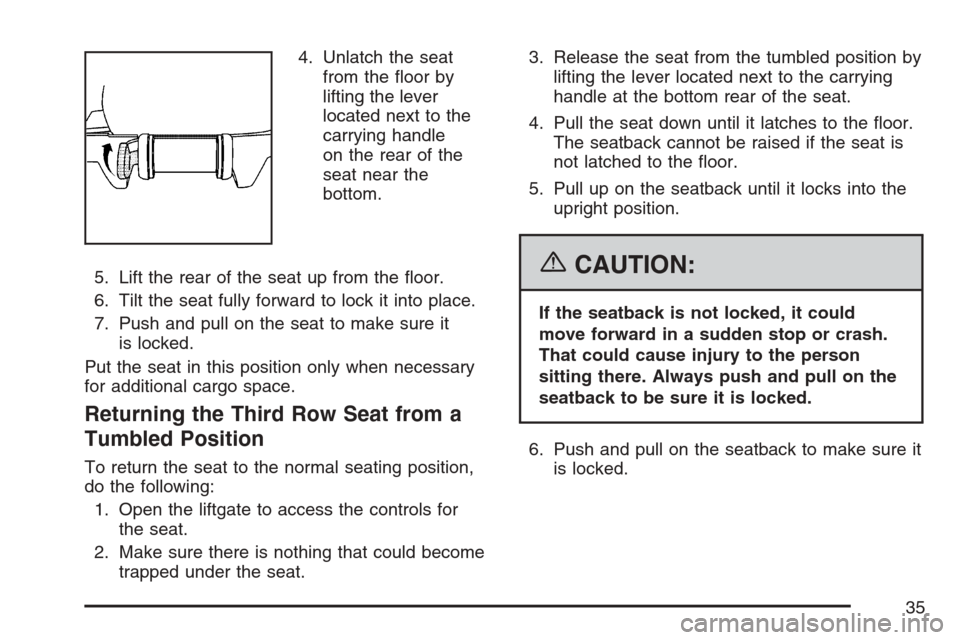 CADILLAC ESCALADE 2007 3.G Owners Guide 4. Unlatch the seat
from the �oor by
lifting the lever
located next to the
carrying handle
on the rear of the
seat near the
bottom.
5. Lift the rear of the seat up from the �oor.
6. Tilt the seat full