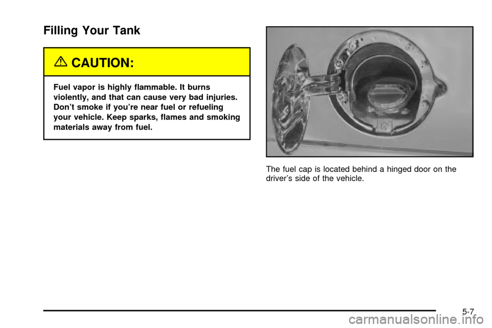 CADILLAC ESCALADE EXT 2003 2.G Owners Manual Filling Your Tank
{CAUTION:
Fuel vapor is highly ¯ammable. It burns
violently, and that can cause very bad injuries.
Dont smoke if youre near fuel or refueling
your vehicle. Keep sparks, ¯ames and