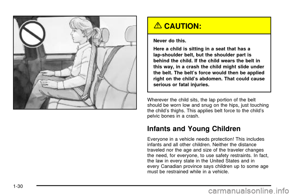 CADILLAC ESCALADE EXT 2004 2.G Owners Guide {CAUTION:
Never do this.
Here a child is sitting in a seat that has a
lap-shoulder belt, but the shoulder part is
behind the child. If the child wears the belt in
this way, in a crash the child might 