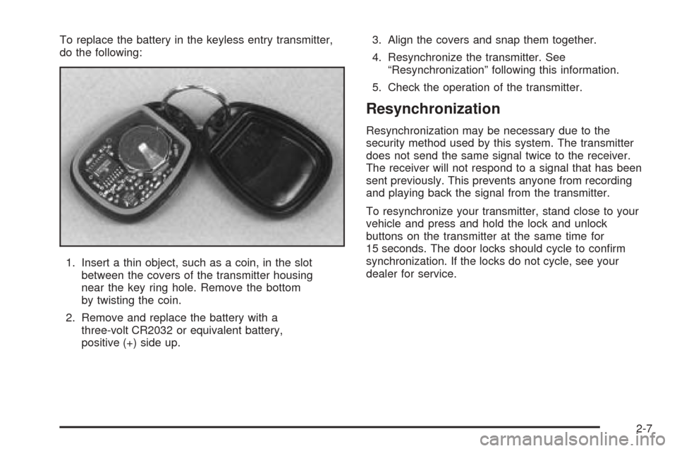 CADILLAC ESCALADE EXT 2005 2.G Manual PDF To replace the battery in the keyless entry transmitter,
do the following:
1. Insert a thin object, such as a coin, in the slot
between the covers of the transmitter housing
near the key ring hole. Re