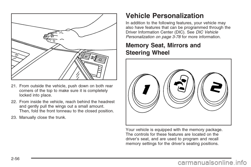 CADILLAC XLR V 2006 1.G Owners Manual 21. From outside the vehicle, push down on both rear
corners of the top to make sure it is completely
locked into place.
22. From inside the vehicle, reach behind the headrest
and gently pull the wing