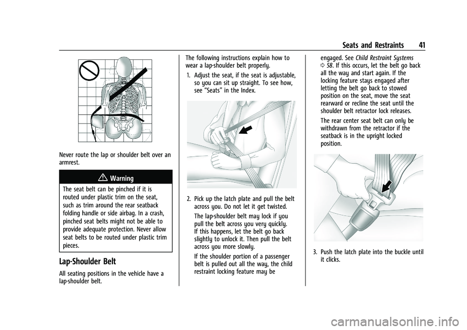 CHEVROLET TRAX 2021 Service Manual Chevrolet TRAX Owner Manual (GMNA-Localizing-U.S./Canada-14609828) -
2021 - CRC - 8/21/20
Seats and Restraints 41
Never route the lap or shoulder belt over an
armrest.
{Warning
The seat belt can be pi