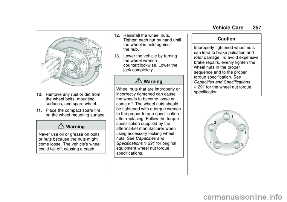 CHEVROLET SONIC 2020  Owners Manual Chevrolet Sonic Owner Manual (GMNA-Localizing-U.S./Canada-13566834) -
2020 - CRC - 10/4/19
Vehicle Care 257
10. Remove any rust or dirt fromthe wheel bolts, mounting
surfaces, and spare wheel.
11. Pla