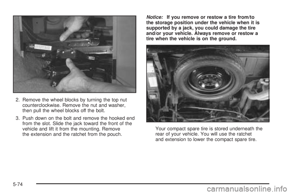 CHEVROLET ASTRO 2005  Owners Manual 2. Remove the wheel blocks by turning the top nut
counterclockwise. Remove the nut and washer,
then pull the wheel blocks off the bolt.
3. Push down on the bolt and remove the hooked end
from the slot