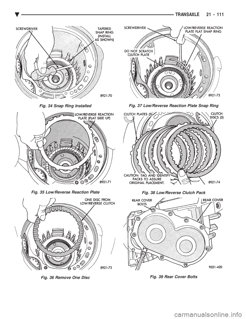 CHEVROLET PLYMOUTH ACCLAIM 1993  Service Manual Fig. 34 Snap Ring Installed
Fig. 35 Low/Reverse Reaction Plate
Fig. 36 Remove One Disc
Fig. 37 Low/Reverse Reaction Plate Snap Ring
Fig. 38 Low/Reverse Clutch Pack
Fig. 39 Rear Cover Bolts
Ä TRANSAXL