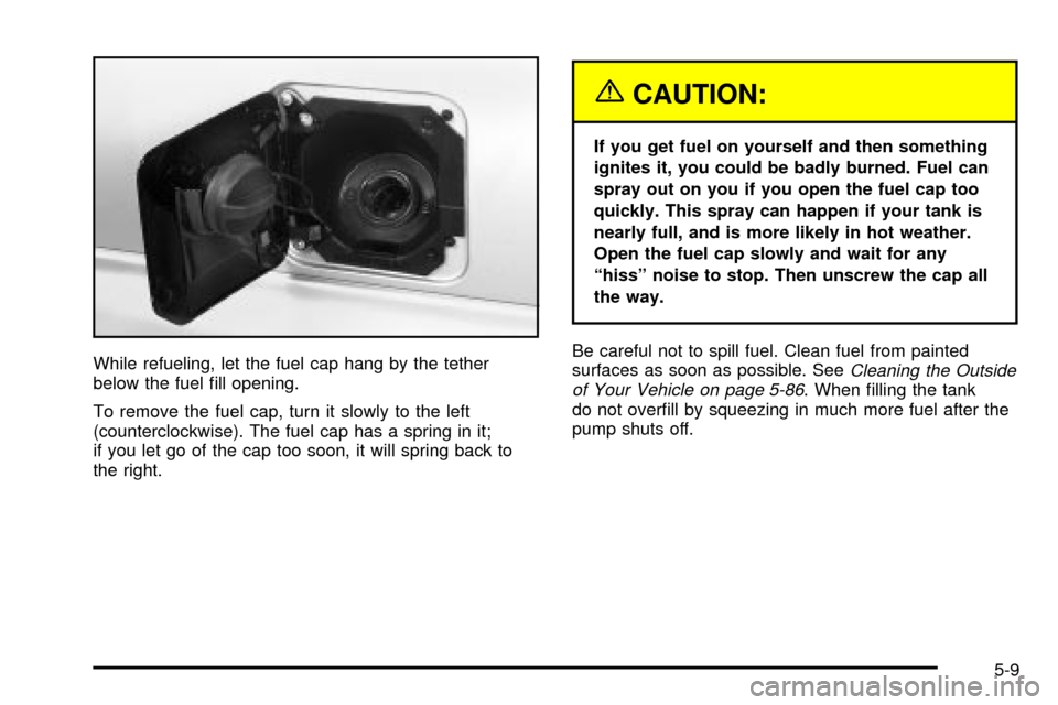 CHEVROLET ASTRO CARGO VAN 2003 2.G Owners Manual While refueling, let the fuel cap hang by the tether
below the fuel ®ll opening.
To remove the fuel cap, turn it slowly to the left
(counterclockwise). The fuel cap has a spring in it;
if you let go 