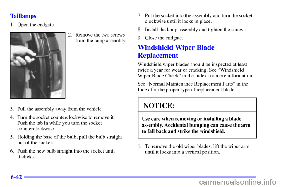 CHEVROLET BLAZER 2002 2.G Owners Manual 6-42 Taillamps
1. Open the endgate.
2. Remove the two screws
from the lamp assembly.
3. Pull the assembly away from the vehicle.
4. Turn the socket counterclockwise to remove it. 
Push the tab in whil
