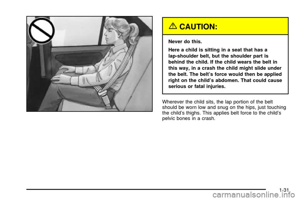 CHEVROLET CAVALIER 2003 3.G Owners Manual {CAUTION:
Never do this.
Here a child is sitting in a seat that has a
lap-shoulder belt, but the shoulder part is
behind the child. If the child wears the belt in
this way, in a crash the child might 