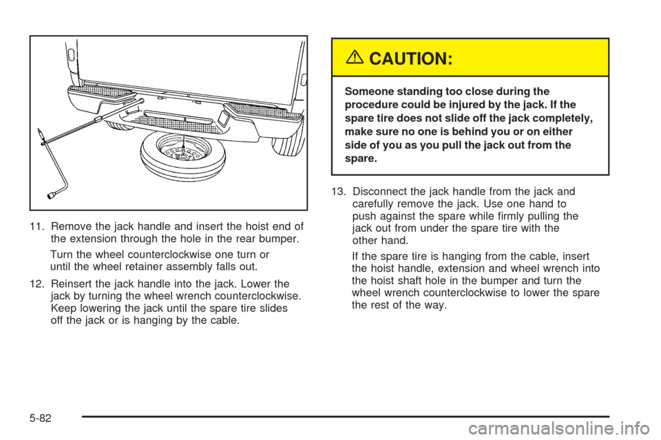 CHEVROLET COLORADO 2005 1.G Owners Manual 11. Remove the jack handle and insert the hoist end of
the extension through the hole in the rear bumper.
Turn the wheel counterclockwise one turn or
until the wheel retainer assembly falls out.
12. R