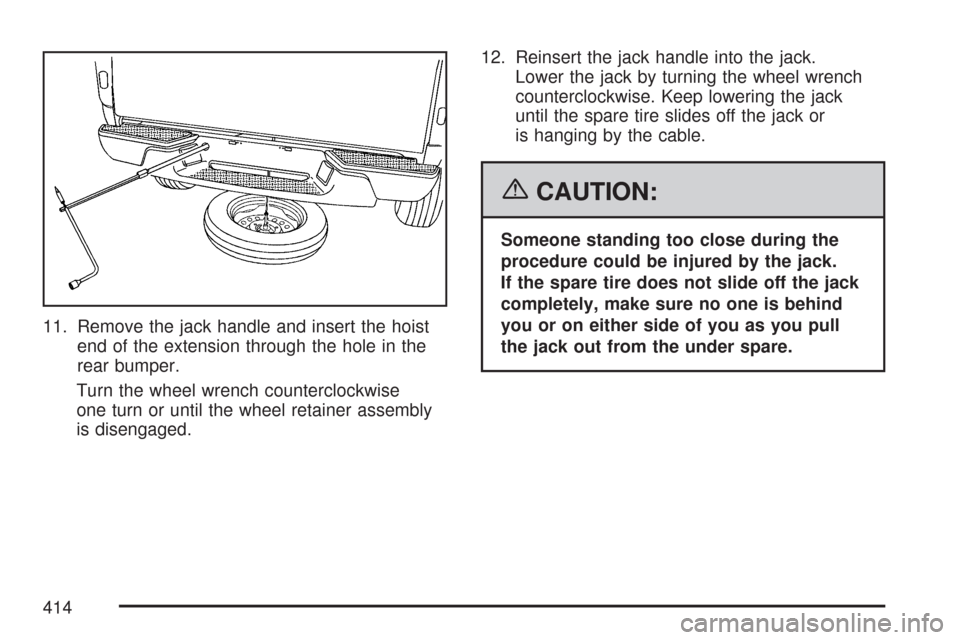 CHEVROLET COLORADO 2007 1.G Owners Manual 11. Remove the jack handle and insert the hoist
end of the extension through the hole in the
rear bumper.
Turn the wheel wrench counterclockwise
one turn or until the wheel retainer assembly
is diseng