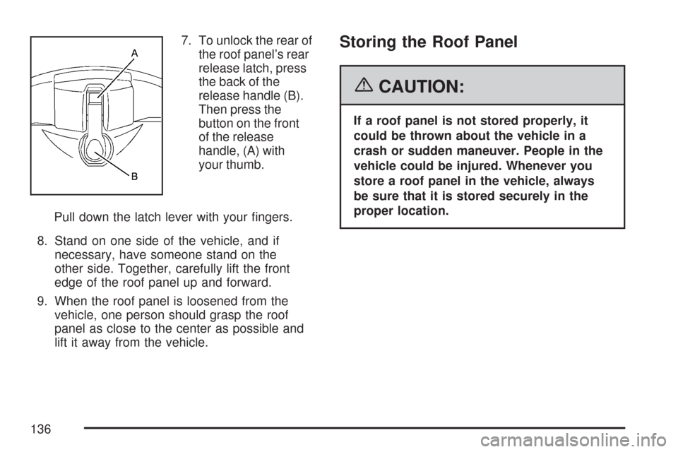 CHEVROLET CORVETTE 2007 6.G Owners Manual 7. To unlock the rear of
the roof panel’s rear
release latch, press
the back of the
release handle (B).
Then press the
button on the front
of the release
handle, (A) with
your thumb.
Pull down the l