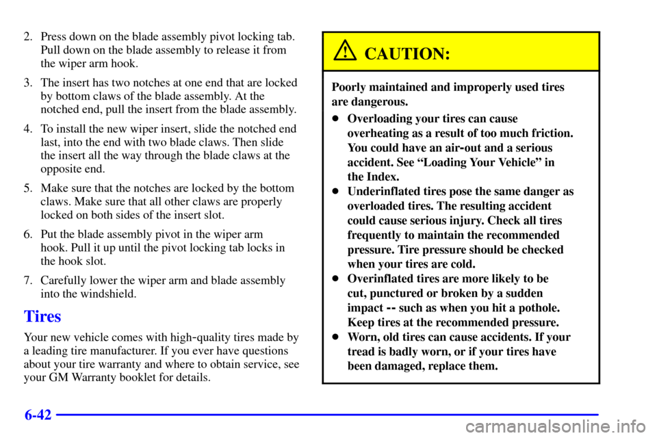 CHEVROLET EXPRESS CARGO VAN 2002 1.G Owners Manual 6-42
2. Press down on the blade assembly pivot locking tab.
Pull down on the blade assembly to release it from
the wiper arm hook.
3. The insert has two notches at one end that are locked
by bottom cl