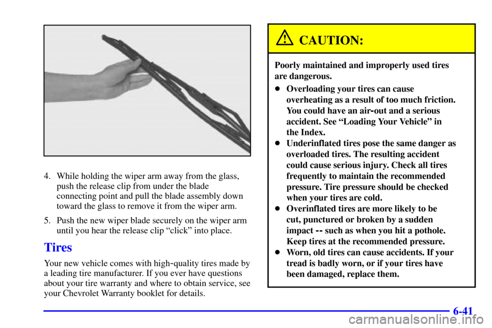 CHEVROLET MONTE CARLO 2001 6.G Owners Manual 6-41
4. While holding the wiper arm away from the glass,
push the release clip from under the blade
connecting point and pull the blade assembly down
toward the glass to remove it from the wiper arm.
