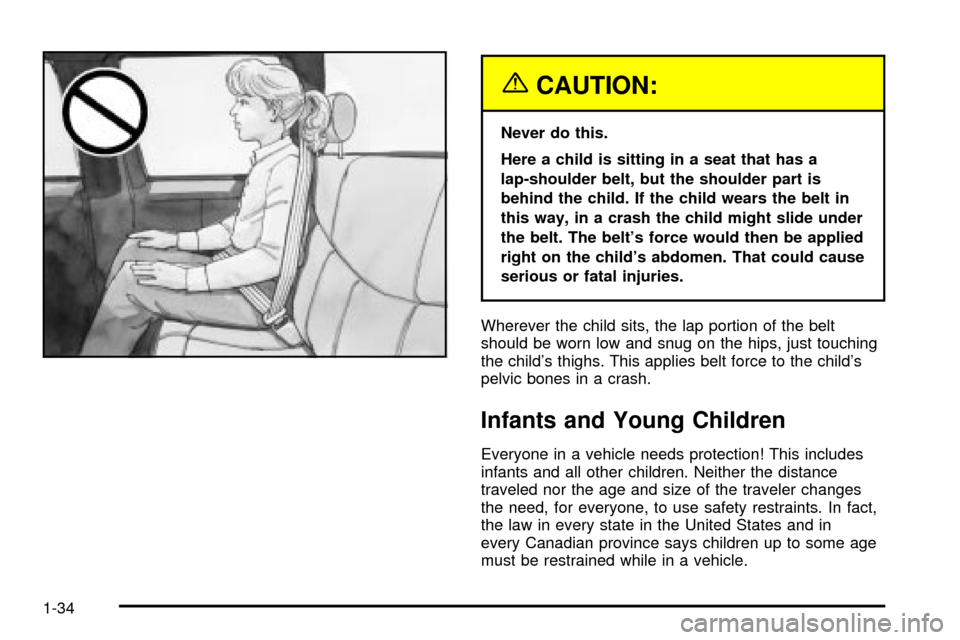 CHEVROLET SILVERADO 2003 1.G Owners Manual {CAUTION:
Never do this.
Here a child is sitting in a seat that has a
lap-shoulder belt, but the shoulder part is
behind the child. If the child wears the belt in
this way, in a crash the child might 