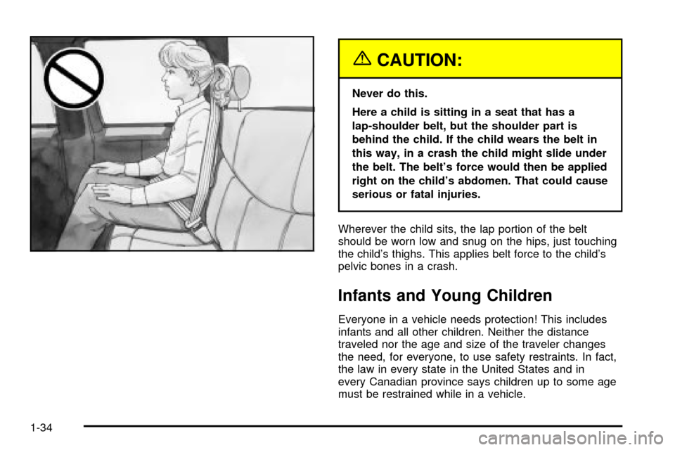CHEVROLET SILVERADO 2003 1.G Owners Guide {CAUTION:
Never do this.
Here a child is sitting in a seat that has a
lap-shoulder belt, but the shoulder part is
behind the child. If the child wears the belt in
this way, in a crash the child might 