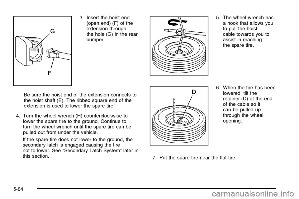 CHEVROLET SILVERADO 2003 1.G Owners Manual 3. Insert the hoist end
(open end) (F) of the
extension through
the hole (G) in the rear
bumper.
Be sure the hoist end of the extension connects to
the hoist shaft (E). The ribbed square end of the
ex