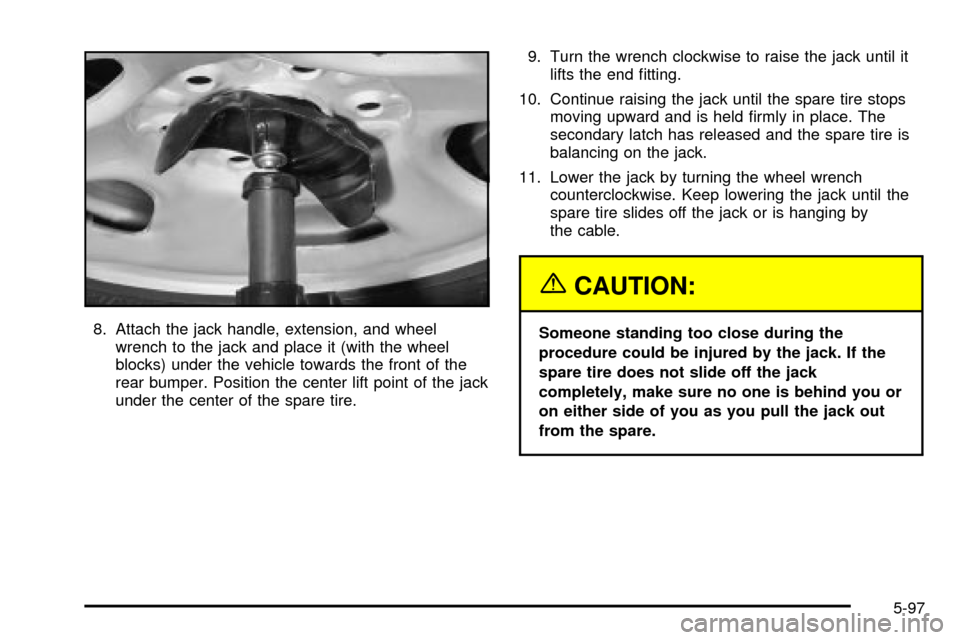 CHEVROLET TAHOE 2003 2.G Owners Manual 8. Attach the jack handle, extension, and wheel
wrench to the jack and place it (with the wheel
blocks) under the vehicle towards the front of the
rear bumper. Position the center lift point of the ja CHEVROLET TAHOE 2003 2.G Owners Manual 8. Attach the jack handle, extension, and wheel
wrench to the jack and place it (with the wheel
blocks) under the vehicle towards the front of the
rear bumper. Position the center lift point of the ja