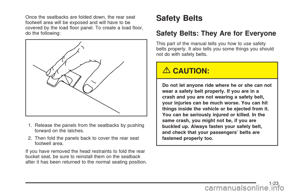 CHEVROLET TAHOE 2005 2.G Owners Manual Once the seatbacks are folded down, the rear seat
footwell area will be exposed and will have to be
covered by the load �oor panel. To create a load �oor,
do the following:
1. Release the panels from 