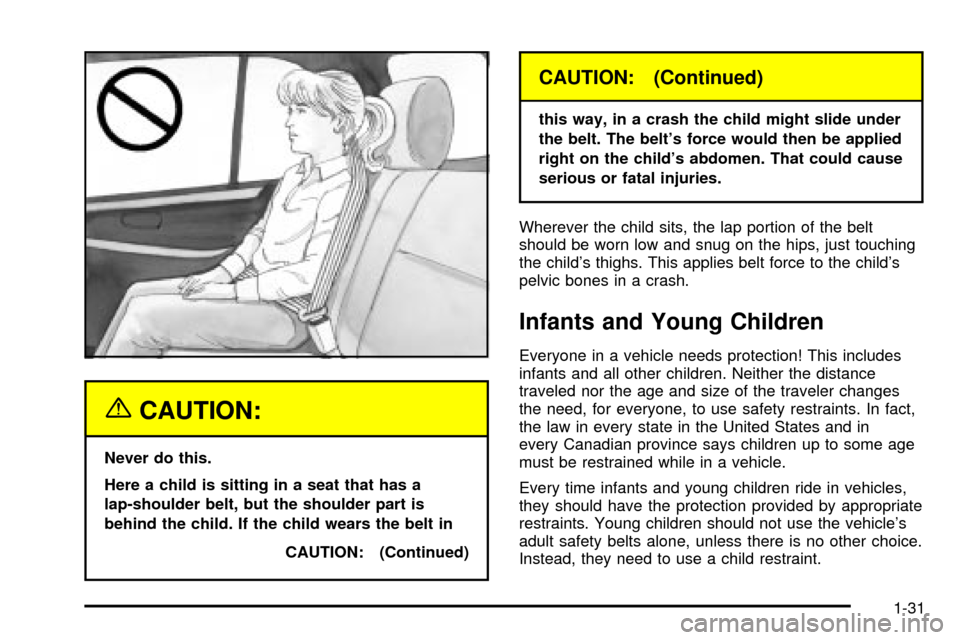 CHEVROLET TRACKER 2004 2.G Owners Guide {CAUTION:
Never do this.
Here a child is sitting in a seat that has a
lap-shoulder belt, but the shoulder part is
behind the child. If the child wears the belt in
CAUTION: (Continued)
CAUTION: (Contin