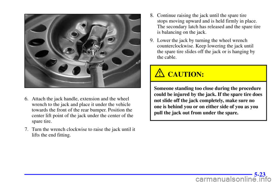 CHEVROLET TRAIL BLAZER 2002 1.G Owners Manual 5-23
6. Attach the jack handle, extension and the wheel
wrench to the jack and place it under the vehicle
towards the front of the rear bumper. Position the
center lift point of the jack under the cen