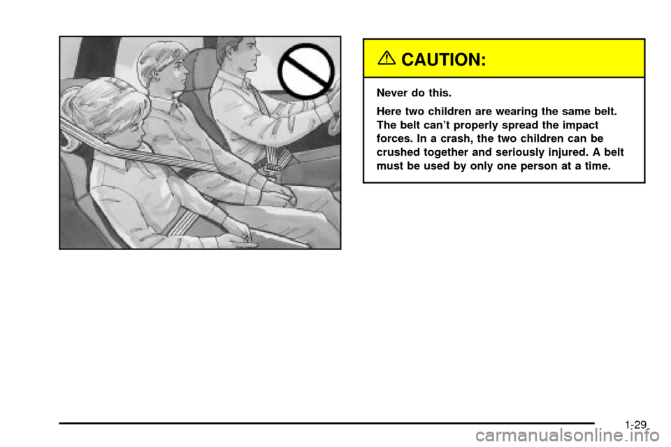 CHEVROLET TRAIL BLAZER 2003 1.G Owners Guide {CAUTION:
Never do this.
Here two children are wearing the same belt.
The belt cant properly spread the impact
forces. In a crash, the two children can be
crushed together and seriously injured. A be