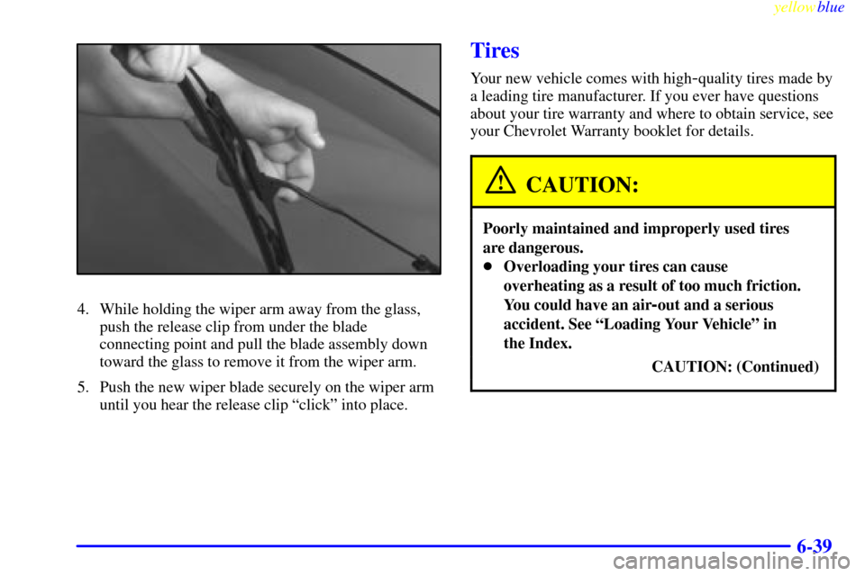CHEVROLET VENTURE 1999 1.G Owners Manual yellowblue     
6-39
4. While holding the wiper arm away from the glass,
push the release clip from under the blade
connecting point and pull the blade assembly down
toward the glass to remove it from