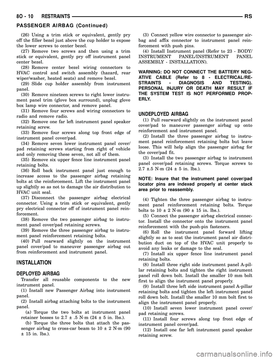 CHRYSLER VOYAGER 2004 Service Manual (26) Using a trim stick or equivalent, gently pry
off the filler bezel just above the cup holder to expose
the lower screws to center bezel.
(27) Remove two screws and then using a trim
stick or equiv CHRYSLER VOYAGER 2004 Service Manual (26) Using a trim stick or equivalent, gently pry
off the filler bezel just above the cup holder to expose
the lower screws to center bezel.
(27) Remove two screws and then using a trim
stick or equiv
