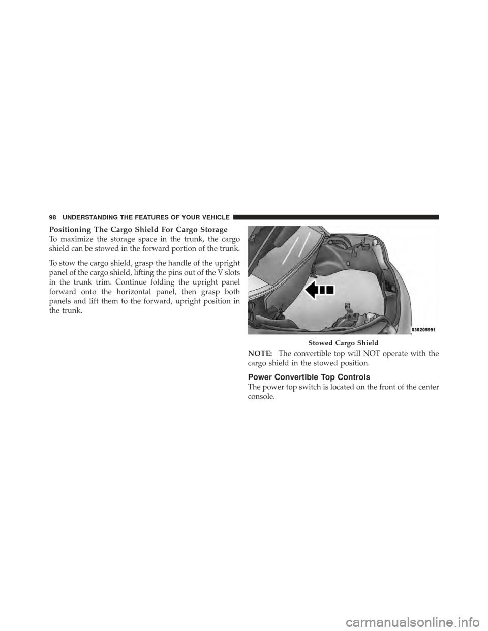 CHRYSLER 200 CONVERTIBLE 2012 1.G Owners Manual Positioning The Cargo Shield For Cargo Storage
To maximize the storage space in the trunk, the cargo
shield can be stowed in the forward portion of the trunk.
To stow the cargo shield, grasp the handl