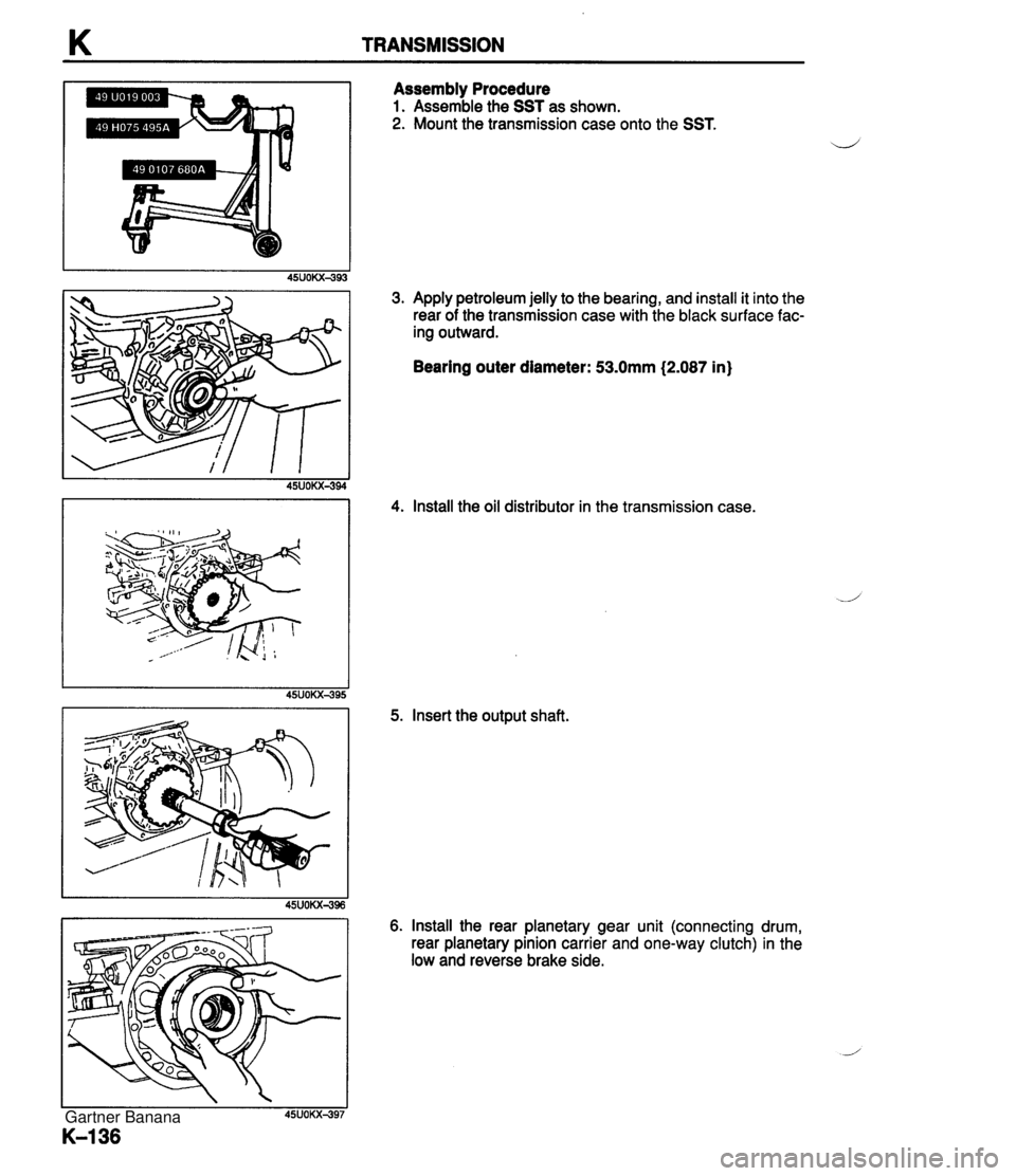 MAZDA MX-5 1994  Workshop Manual K TRANSMISSION Assembly Procedure 1. Assemble the SST as shown. 2. Mount the transmission case onto the SST. 3. Apply petroleum jelly to the bearing, and install it into the rear of the transmission c